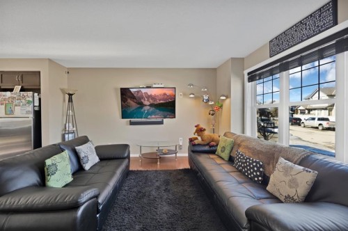 108 Panamount Way Nw, Calgary, AB - Indoor Photo Showing Living Room