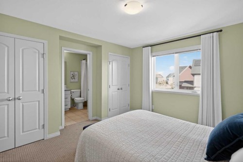 228 Mahogany Grove Se, Calgary, AB - Indoor Photo Showing Bedroom