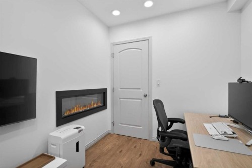 228 Mahogany Grove Se, Calgary, AB - Indoor Photo Showing Office With Fireplace