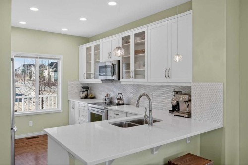 228 Mahogany Grove Se, Calgary, AB - Indoor Photo Showing Kitchen With Double Sink With Upgraded Kitchen