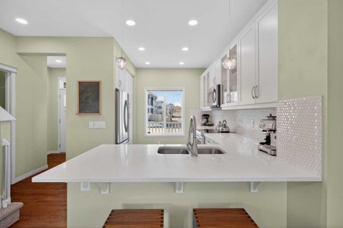 228 Mahogany Grove Se, Calgary, AB - Indoor Photo Showing Kitchen With Double Sink With Upgraded Kitchen