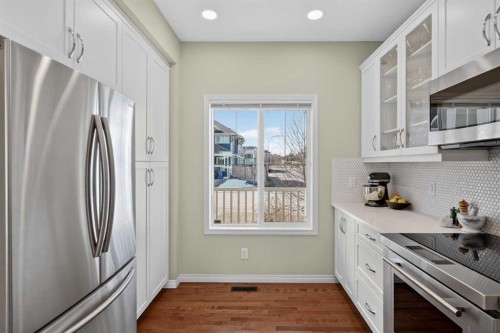 228 Mahogany Grove Se, Calgary, AB - Indoor Photo Showing Kitchen With Upgraded Kitchen