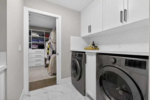 105 Westpoint Way Sw, Calgary, AB - Indoor Photo Showing Laundry Room