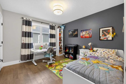 105 Westpoint Way Sw, Calgary, AB - Indoor Photo Showing Bedroom
