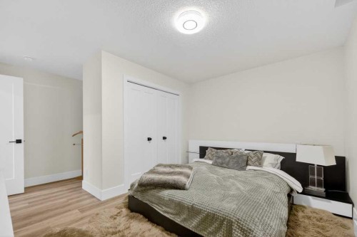 105 Westpoint Way Sw, Calgary, AB - Indoor Photo Showing Bedroom