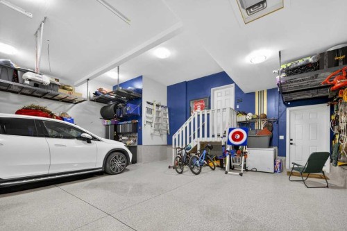 105 Westpoint Way Sw, Calgary, AB - Indoor Photo Showing Garage
