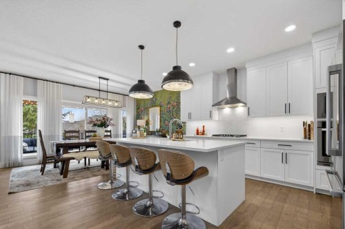 105 Westpoint Way Sw, Calgary, AB - Indoor Photo Showing Kitchen With Upgraded Kitchen