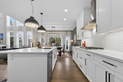 105 Westpoint Way Sw, Calgary, AB - Indoor Photo Showing Kitchen With Upgraded Kitchen