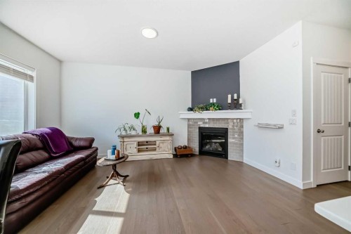 357 Nolanhurst Crescent Nw, Calgary, AB - Indoor Photo Showing Living Room With Fireplace