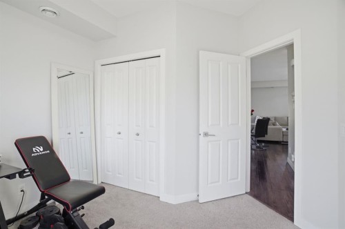 164 Evanscrest Gardens Nw, Calgary, AB - Indoor Photo Showing Bedroom