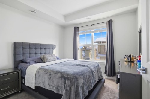 164 Evanscrest Gardens Nw, Calgary, AB - Indoor Photo Showing Bedroom