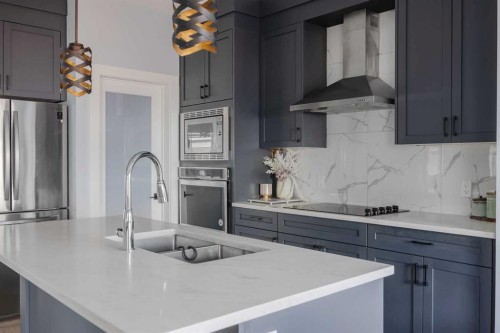 62 Legacy Glen Terrace Se, Calgary, AB - Indoor Photo Showing Kitchen With Double Sink With Upgraded Kitchen