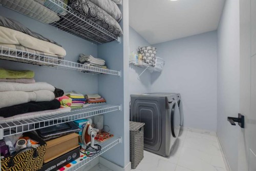 62 Legacy Glen Terrace Se, Calgary, AB - Indoor Photo Showing Laundry Room