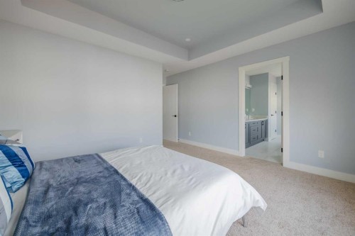 62 Legacy Glen Terrace Se, Calgary, AB - Indoor Photo Showing Bedroom