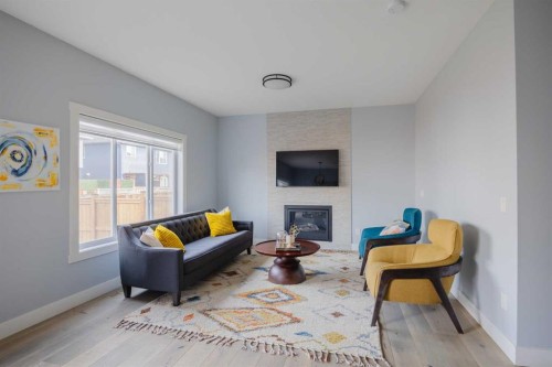 62 Legacy Glen Terrace Se, Calgary, AB - Indoor Photo Showing Living Room With Fireplace