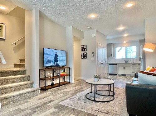 144 Carrington Boulevard Nw, Calgary, AB - Indoor Photo Showing Living Room