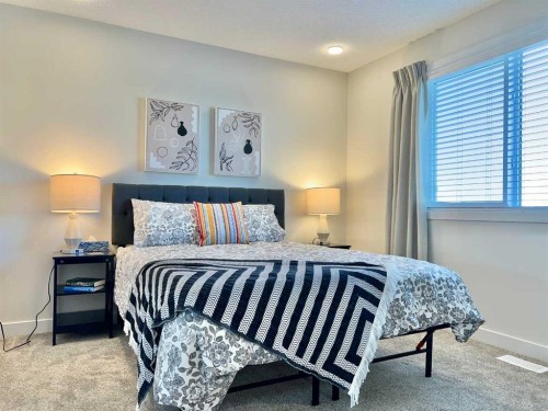 144 Carrington Boulevard Nw, Calgary, AB - Indoor Photo Showing Bedroom