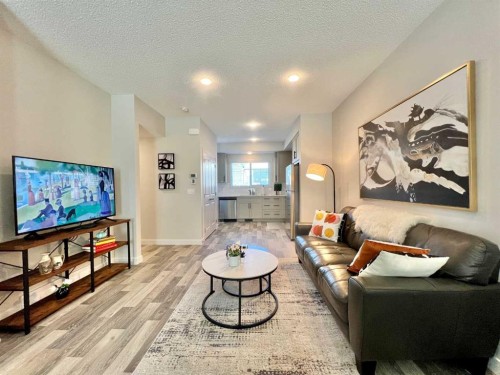 144 Carrington Boulevard Nw, Calgary, AB - Indoor Photo Showing Living Room
