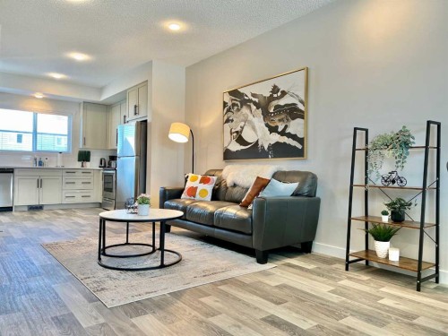 144 Carrington Boulevard Nw, Calgary, AB - Indoor Photo Showing Living Room