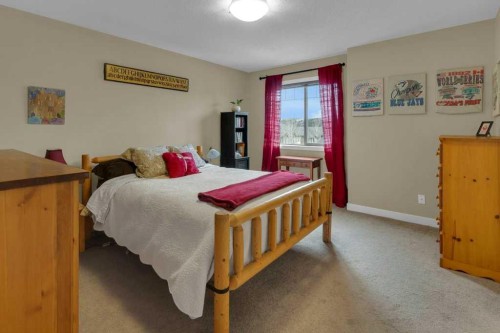 609-413 River Avenue, Cochrane, AB - Indoor Photo Showing Bedroom