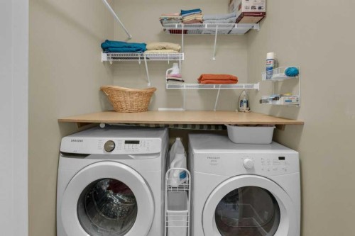 609-413 River Avenue, Cochrane, AB - Indoor Photo Showing Laundry Room