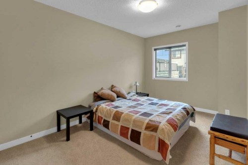 609-413 River Avenue, Cochrane, AB - Indoor Photo Showing Bedroom