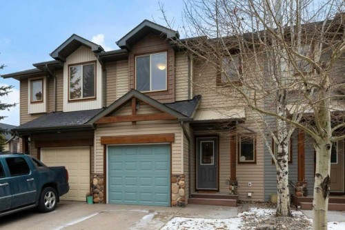 609-413 River Avenue, Cochrane, AB - Outdoor With Facade