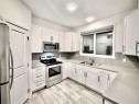189 Carringvue Way Nw, Calgary, AB  - Indoor Photo Showing Kitchen With Double Sink With Upgraded Kitchen 