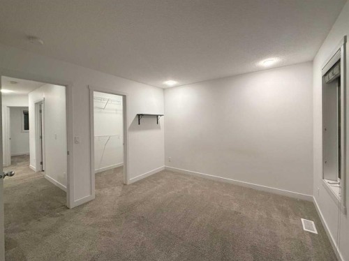 189 Carringvue Way Nw, Calgary, AB - Indoor Photo Showing Other Room