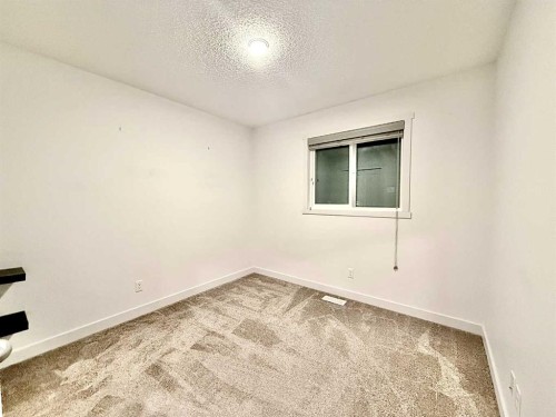 189 Carringvue Way Nw, Calgary, AB - Indoor Photo Showing Other Room