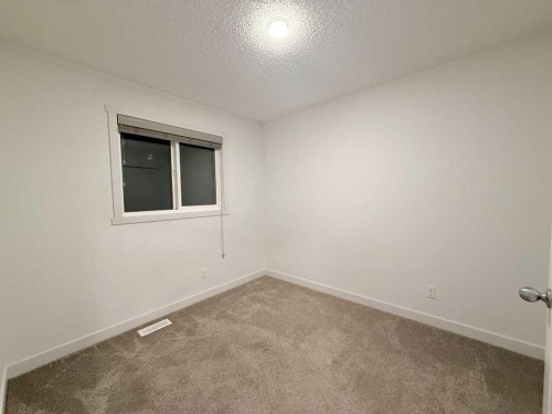 189 Carringvue Way Nw, Calgary, AB - Indoor Photo Showing Other Room