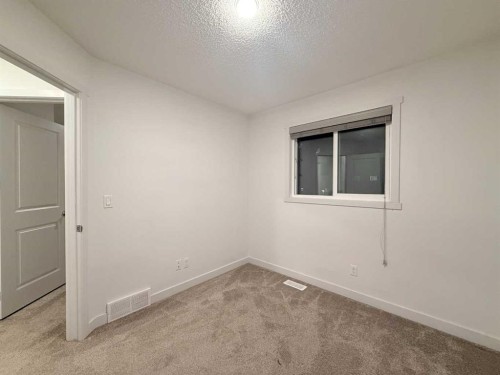 189 Carringvue Way Nw, Calgary, AB - Indoor Photo Showing Other Room