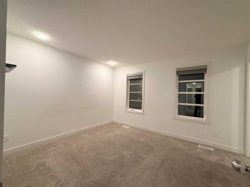 189 Carringvue Way Nw, Calgary, AB - Indoor Photo Showing Other Room