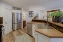 90 Royal Crest Point Nw, Calgary, AB  - Indoor Photo Showing Kitchen With Stainless Steel Kitchen With Double Sink 