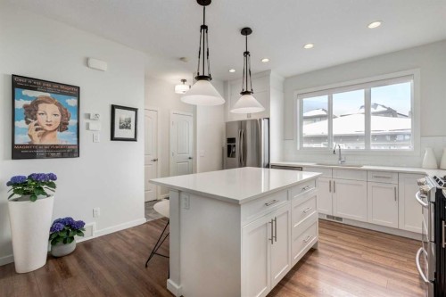 128 Heritage Heights, Cochrane, AB - Indoor Photo Showing Kitchen With Upgraded Kitchen