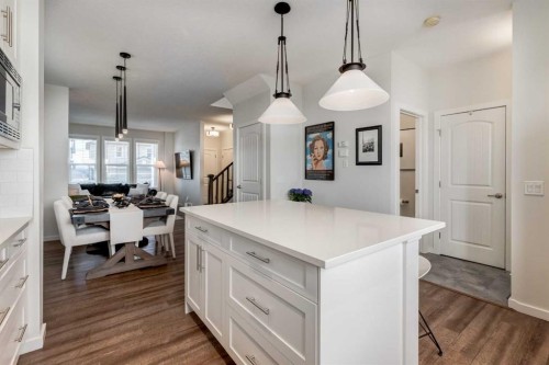 128 Heritage Heights, Cochrane, AB - Indoor Photo Showing Kitchen