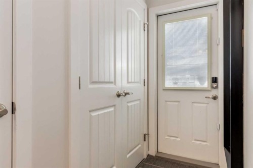 128 Heritage Heights, Cochrane, AB - Indoor Photo Showing Other Room