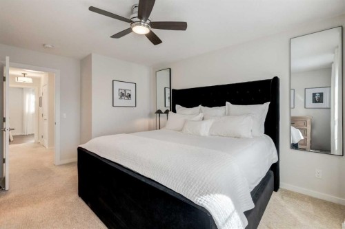 128 Heritage Heights, Cochrane, AB - Indoor Photo Showing Bedroom