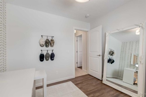 128 Heritage Heights, Cochrane, AB - Indoor Photo Showing Other Room