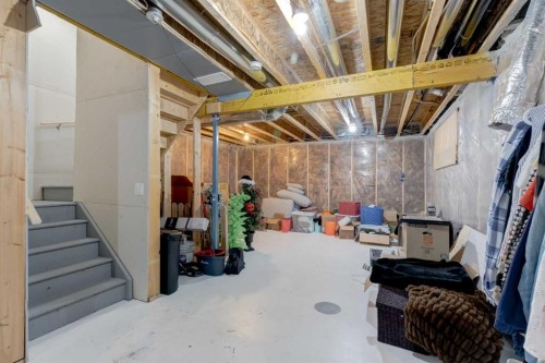 128 Heritage Heights, Cochrane, AB - Indoor Photo Showing Basement