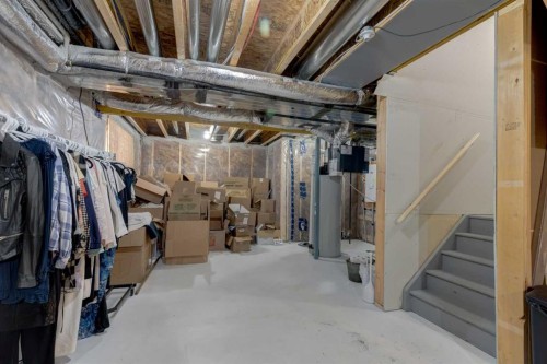 128 Heritage Heights, Cochrane, AB - Indoor Photo Showing Basement