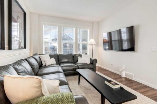 128 Heritage Heights, Cochrane, AB - Indoor Photo Showing Living Room