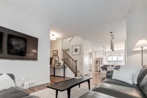 128 Heritage Heights, Cochrane, AB - Indoor Photo Showing Living Room