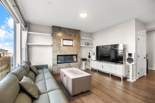 17 Calhoun Crescent Ne, Calgary, AB - Indoor Photo Showing Living Room With Fireplace