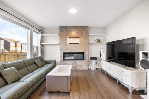 17 Calhoun Crescent Ne, Calgary, AB - Indoor Photo Showing Living Room With Fireplace