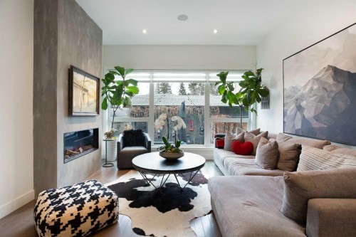1911 31 Avenue Sw, Calgary, AB - Indoor Photo Showing Living Room With Fireplace
