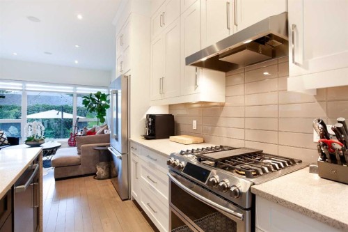 1911 31 Avenue Sw, Calgary, AB - Indoor Photo Showing Kitchen With Upgraded Kitchen