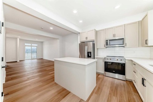 86 Heirloom Passage Se, Calgary, AB - Indoor Photo Showing Kitchen