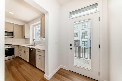 86 Heirloom Passage Se, Calgary, AB - Indoor Photo Showing Kitchen