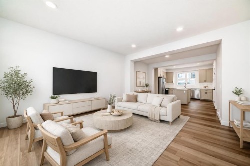 86 Heirloom Passage Se, Calgary, AB - Indoor Photo Showing Living Room